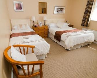 O Neills Bed and Breakfast - דינגל - חדר שינה