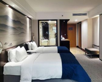 Tianze Enjoy Hotel - Fuzhou - Schlafzimmer