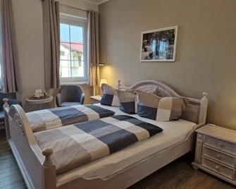 Hotel Garni Haus Sonneneck - Thale - Camera da letto