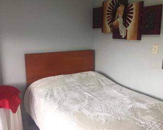 Restaurante Los Cambulos - מאניזאלס - חדר שינה