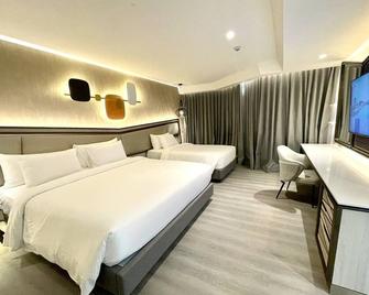 Amethyst Hotel Pattaya - Pattaya - Schlafzimmer