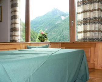 Albergo Miravalle - Forni Avoltri - Bedroom