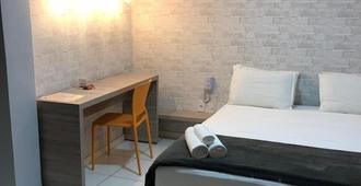 Center Apart Hotel - Barreiras - Schlafzimmer