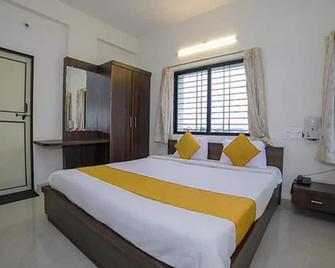 Fabhotel Seva Service Apartment - Nagpur - Bedroom