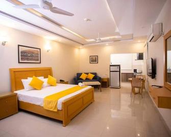 Maati Spaces - Rooms with Kitchen - Lahore - Bedroom