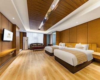 Jinpeng International Hotel (Duyun Dashiban Ancient Street) - Qiannan - Bedroom