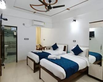 Hotel Aman Residency - Prayagraj - Bedroom