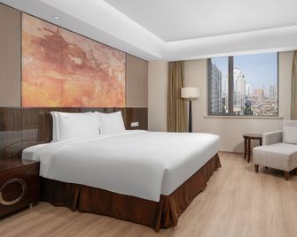 Holiday Inn Nanjing Aqua City By IHG - נאנז'ינג - חדר שינה