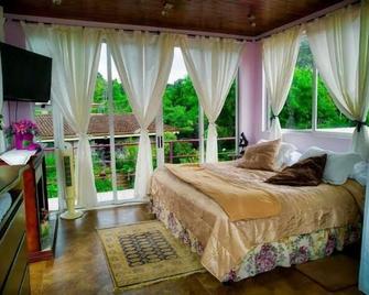 Gosen B&B - Heredia - Schlafzimmer