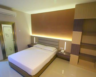 لوفينا إن باتام سنتر - باتام كوتا - غرفة نوم