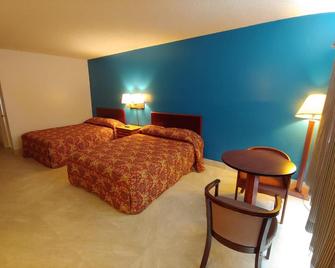 Relax Inn Silver Springs - Silver Springs - Спальня