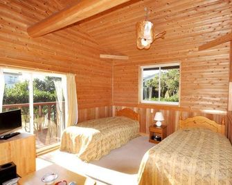 Hotel Akamon - Izu Ōshima - Slaapkamer