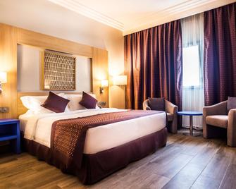 جولدن توليب لو ديبلوميت كوتونو - كوتونو - غرفة نوم