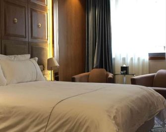 New Melody Hotel - Xi'an - Habitación