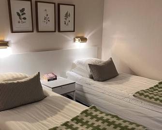Hotell Garvaren - Ljungby - Camera da letto