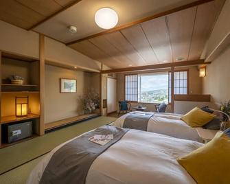 Onsen Hotel Omoto - Matsumoto - Bedroom