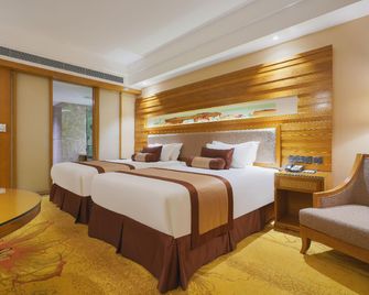 Wanyi Lijing Hotel, Huaxi Park & Shili Hetan Scenic Area, Guiyang (Metro Station nearby) - Guiyang - Camera da letto