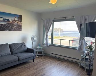 Millie May House - Trout River - Living room