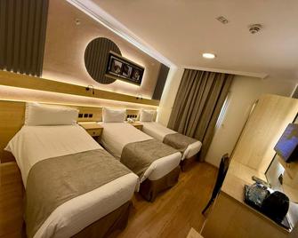 Azka Al Safa Hotel - Mecca - Bedroom