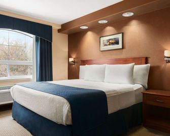 Days Inn & Suites by Wyndham Brandon - Brandon - Makuuhuone