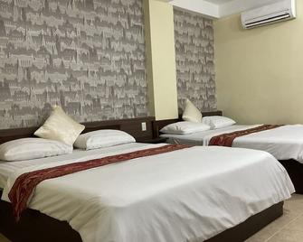 Minh Chau Hotel - Ho Chi Minh Stadt - Schlafzimmer