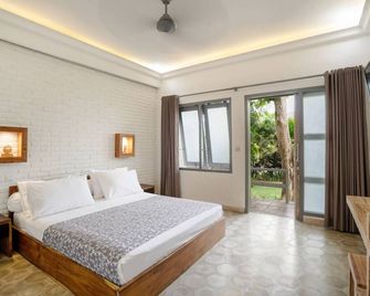Casa Asia - South Kuta - חדר שינה
