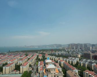 Tuyuan Boutique Holiday Apartment (Weihai Haishang Park Hanlefang East Street) - Weihai - Bâtiment