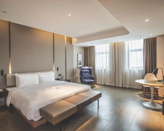 Atour Hotel (Jiangyin Binjiang Middle Road Sports Center) - Wuxi - Schlafzimmer