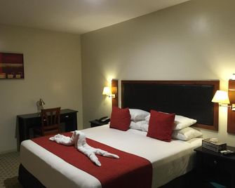 Victoria Palms Hotel - Сува - Спальня
