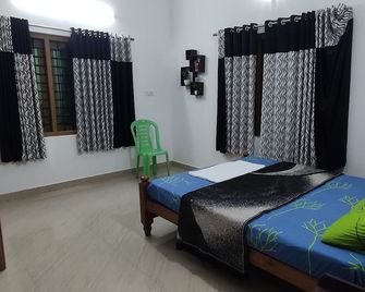 Munnar Village Homes - Munnar - Slaapkamer