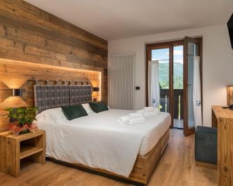 Albergo Alla Posta - מדונה די קמפייו - חדר שינה