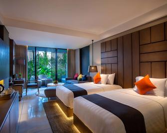 Wyndham Tamansari Jivva Resort Bali - Klungkung - חדר שינה