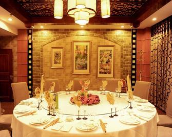 Jining Media Boutique Hotel - Ťi-ning - Jídelna
