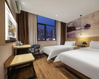 Jiaozuo Century Star Hotel (Jianshe Road Jiaozuo Station) - Jiaozuo - Slaapkamer