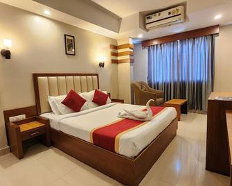 Hotel n pavilion - Mysuru - Schlafzimmer