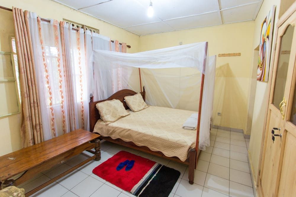 Golf Eden Guesthouse - קיגאלי - חדר שינה