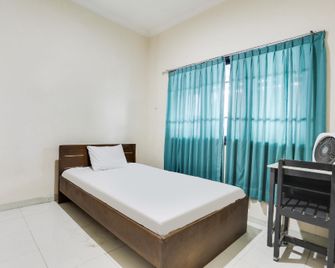 Spot On 91770 441 Pemuda Homestay - Samarinda - Chambre