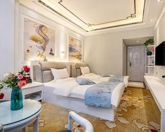 Jinlong Business Hotel - Chuxiong - Bedroom