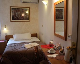 Primavera Mini Hotel - פרוג'ה - חדר שינה