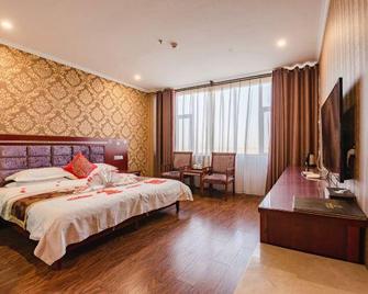 Ju De Hotel - Jiayuguan - Camera da letto