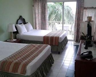 Montego Bay Best Kept Secret 4 B/R Apartments - Block A, Unit 1 & 2 - مونتيغو باي - غرفة نوم