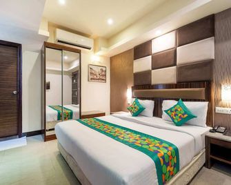 Treebo Venition Inn - Koimbatur - Ložnice
