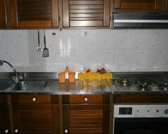 Tempio di Giove Park - Carrozziere - Cocina