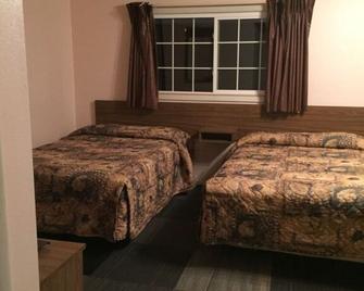 Best Budget Inn - Charles City - Bedroom