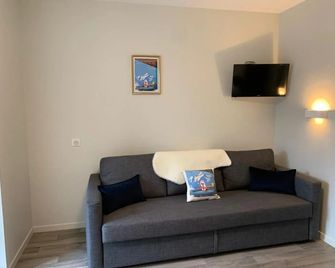 Logis Hotel Le Regis - Mont-Dore - Вітальня