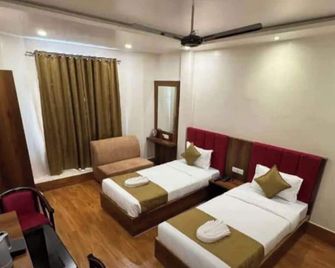 Kashi Family Stay - ורנאסי - חדר שינה