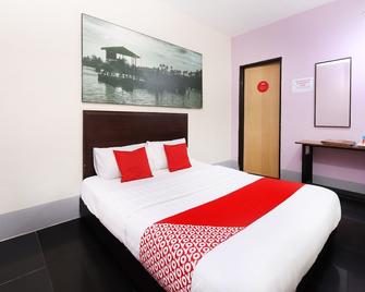Oyo 712 Hotel Corridor - Gambang - Camera da letto