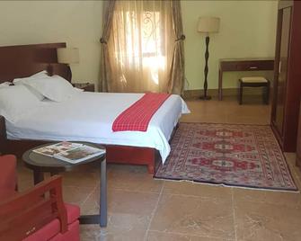 Nature's Green Beach Resort - Kampala - Schlafzimmer