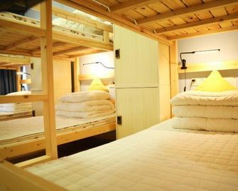 Enjoy Youth Hostel (Wuhan Liangdao Street) - Wuhan - Schlafzimmer