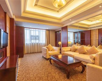 Berlin Jianguo International Hotel - Zhumadian - Living room